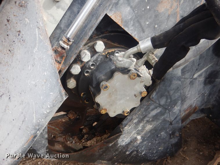 image for item DJ7017 Caterpillar SW345B-80  skid steer rock saw