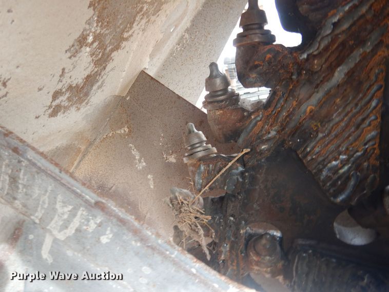 image for item DJ7017 Caterpillar SW345B-80  skid steer rock saw