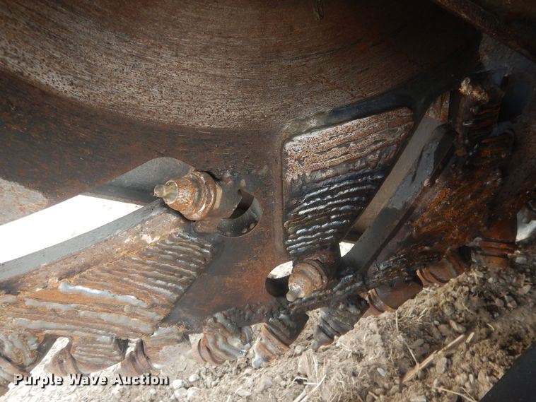 image for item DJ7017 Caterpillar SW345B-80  skid steer rock saw