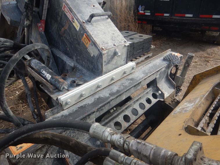 image for item DJ7017 Caterpillar SW345B-80  skid steer rock saw