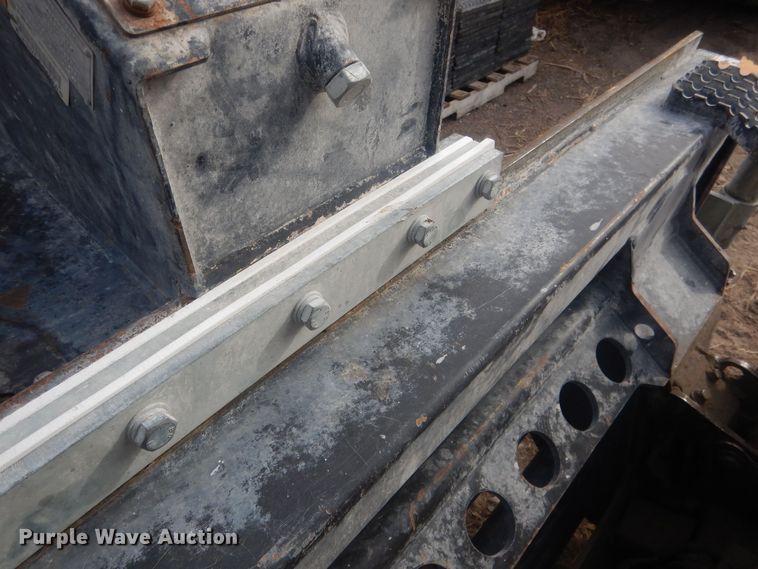 image for item DJ7017 Caterpillar SW345B-80  skid steer rock saw