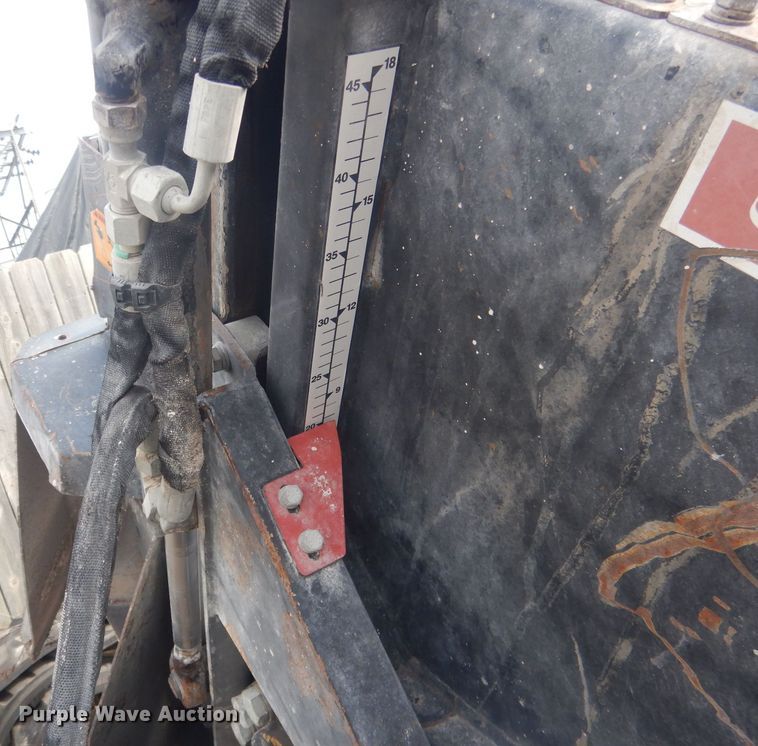 image for item DJ7017 Caterpillar SW345B-80  skid steer rock saw