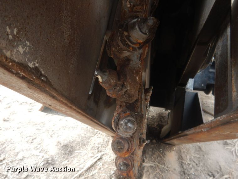 image for item DJ7017 Caterpillar SW345B-80  skid steer rock saw