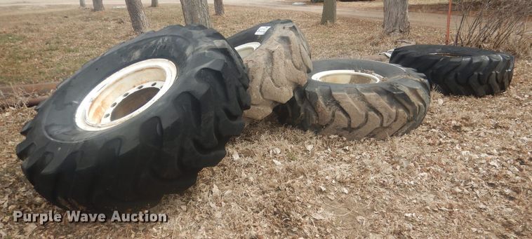 image for item DJ7022 (4) Toyo 16.00-24 tires and wheels