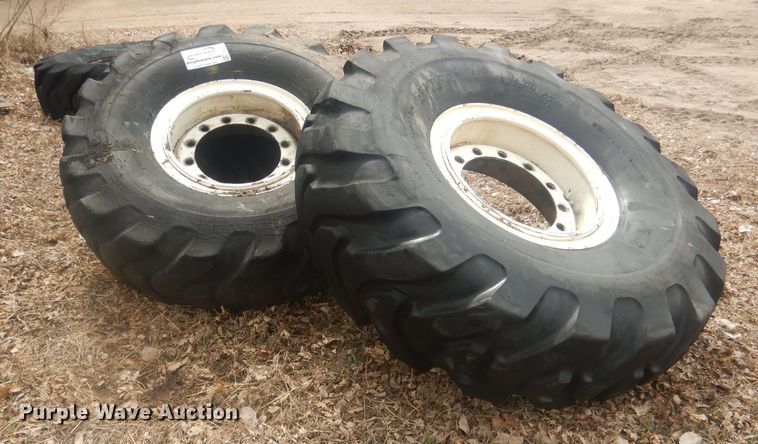 image for item DJ7022 (4) Toyo 16.00-24 tires and wheels