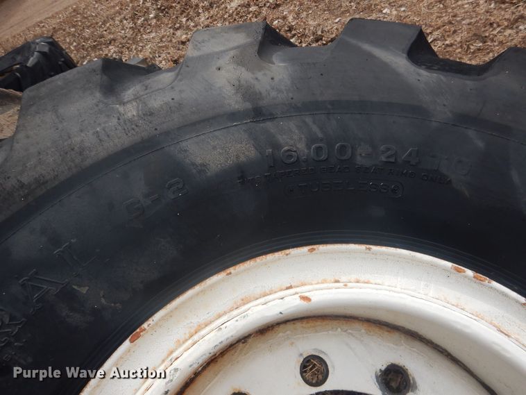 image for item DJ7022 (4) Toyo 16.00-24 tires and wheels