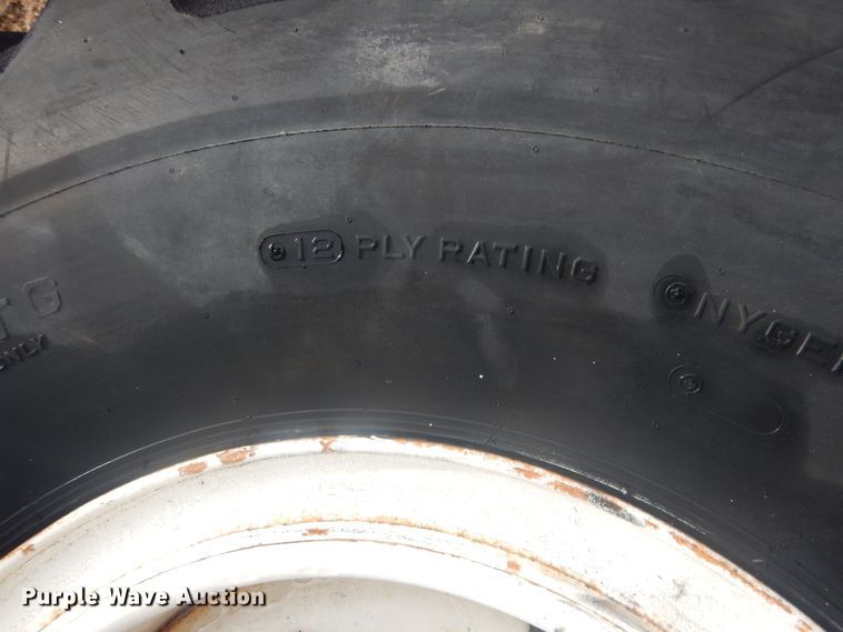 image for item DJ7022 (4) Toyo 16.00-24 tires and wheels