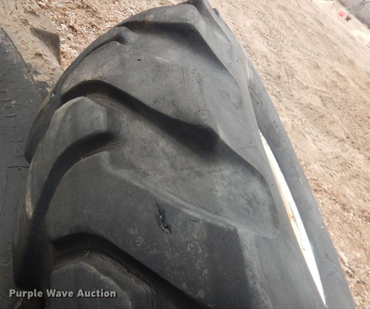 image for item DJ7022 (4) Toyo 16.00-24 tires and wheels