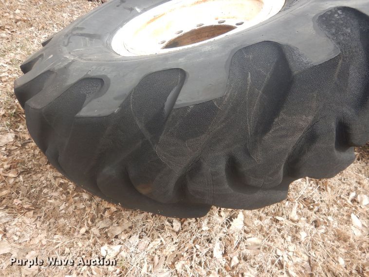 image for item DJ7022 (4) Toyo 16.00-24 tires and wheels