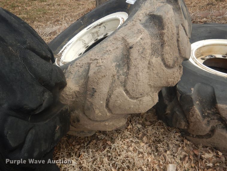 image for item DJ7022 (4) Toyo 16.00-24 tires and wheels