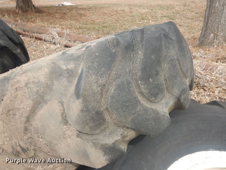 image for item DJ7022 (4) Toyo 16.00-24 tires and wheels