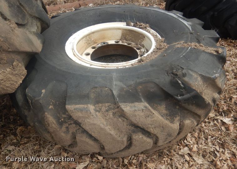 image for item DJ7022 (4) Toyo 16.00-24 tires and wheels