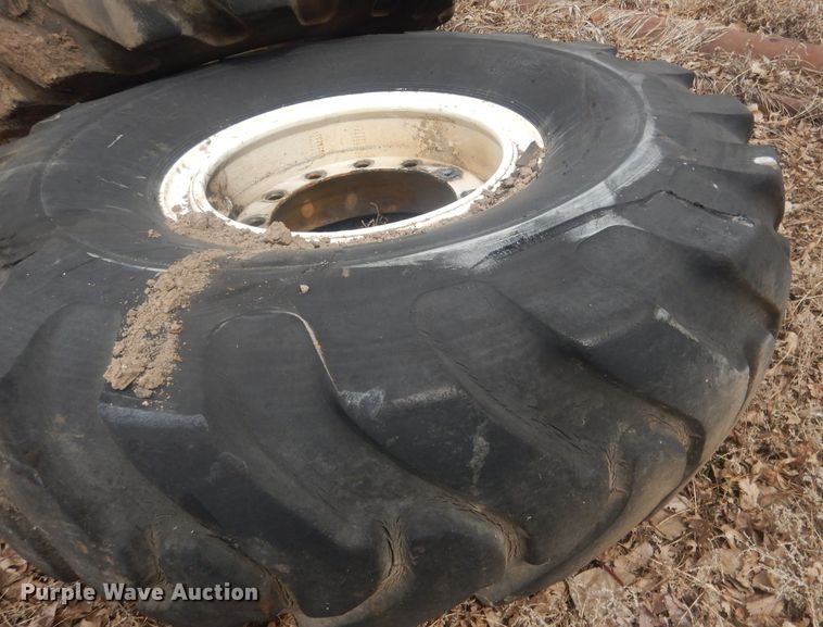 image for item DJ7022 (4) Toyo 16.00-24 tires and wheels