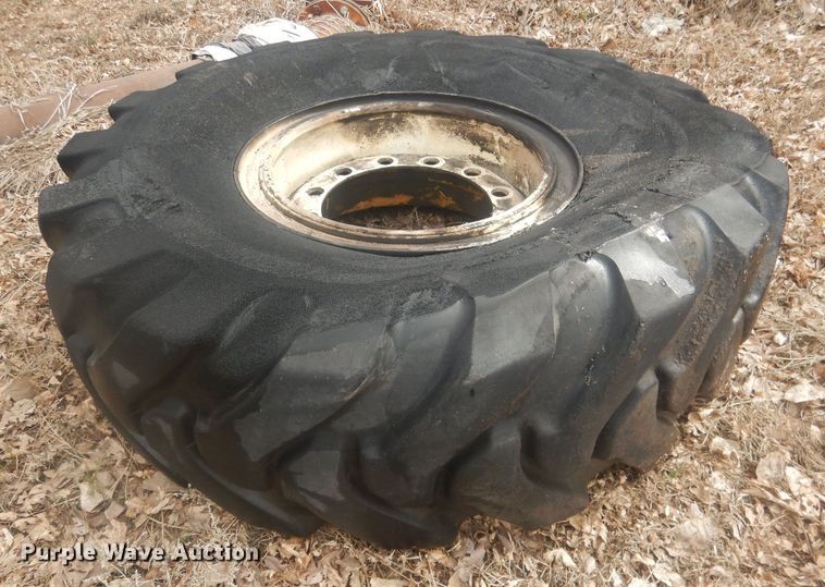 image for item DJ7022 (4) Toyo 16.00-24 tires and wheels