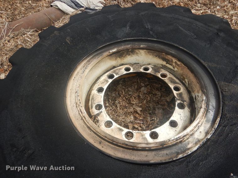 image for item DJ7022 (4) Toyo 16.00-24 tires and wheels