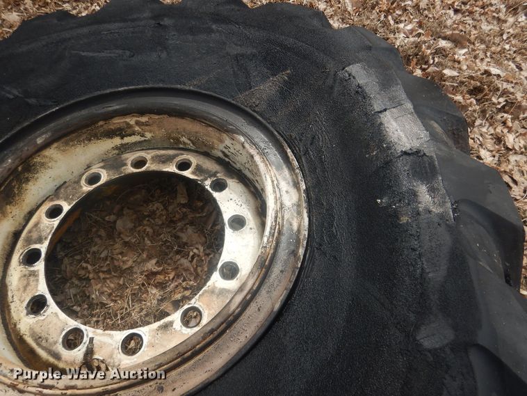 image for item DJ7022 (4) Toyo 16.00-24 tires and wheels