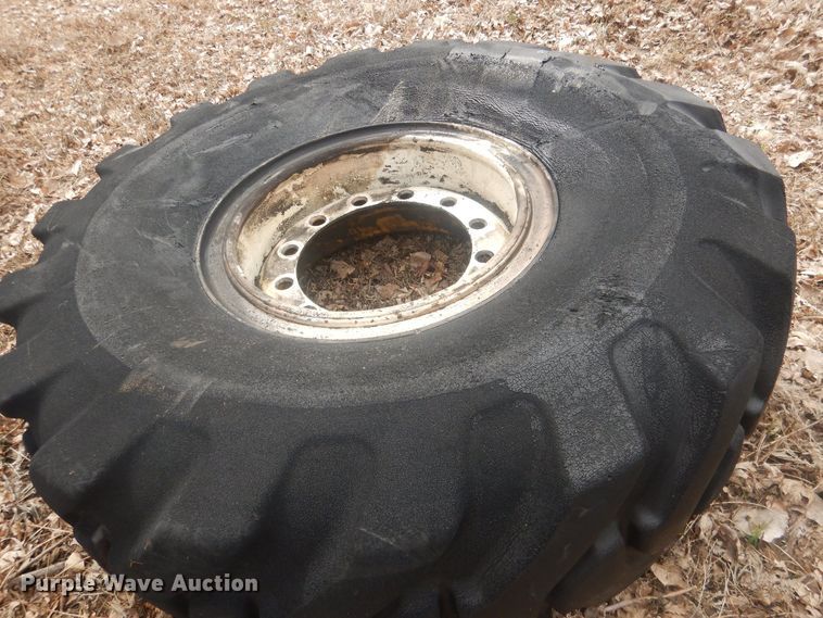 image for item DJ7022 (4) Toyo 16.00-24 tires and wheels