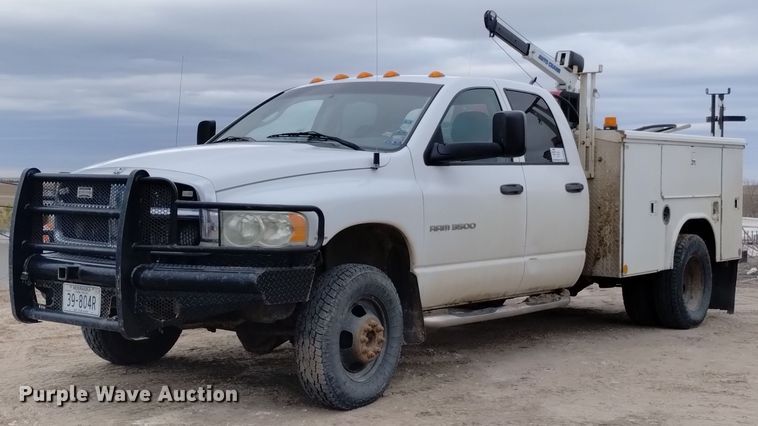 image for item DN6357 2003 Dodge Ram 3500  Quad Cab utility bed pickup truck