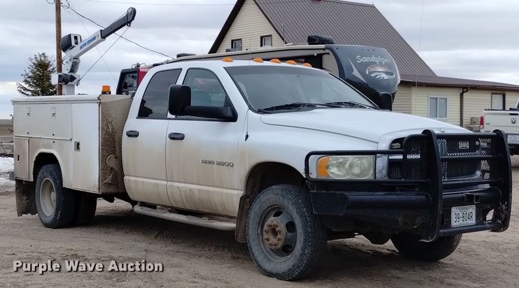 image for item DN6357 2003 Dodge Ram 3500  Quad Cab utility bed pickup truck