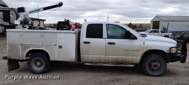 image for item DN6357 2003 Dodge Ram 3500  Quad Cab utility bed pickup truck
