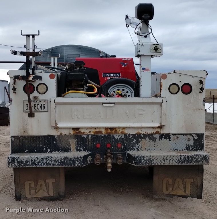 image for item DN6357 2003 Dodge Ram 3500  Quad Cab utility bed pickup truck