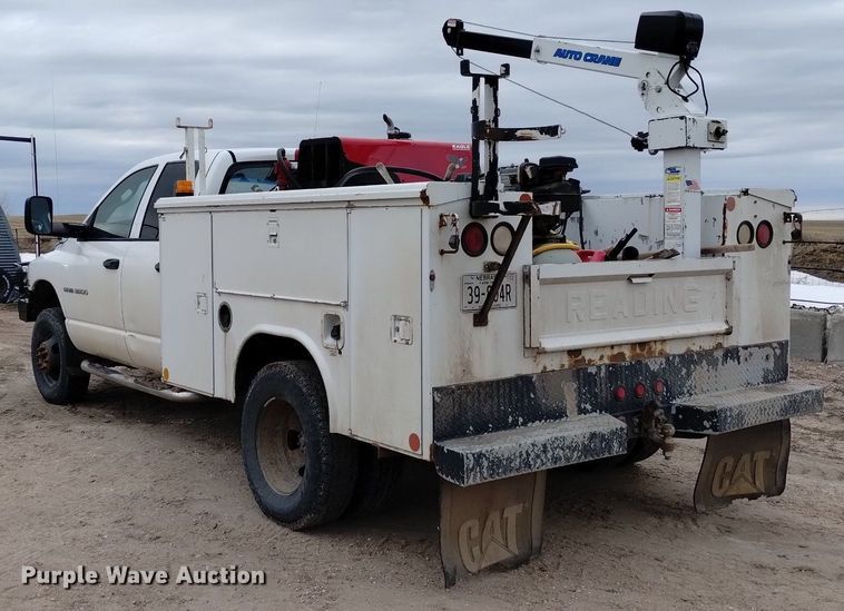 image for item DN6357 2003 Dodge Ram 3500  Quad Cab utility bed pickup truck