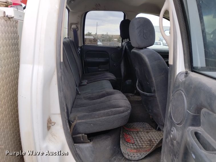 image for item DN6357 2003 Dodge Ram 3500  Quad Cab utility bed pickup truck