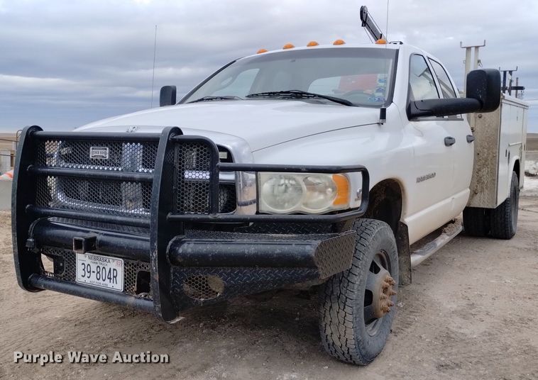 image for item DN6357 2003 Dodge Ram 3500  Quad Cab utility bed pickup truck