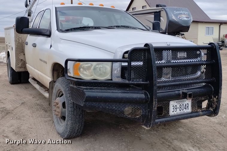 image for item DN6357 2003 Dodge Ram 3500  Quad Cab utility bed pickup truck