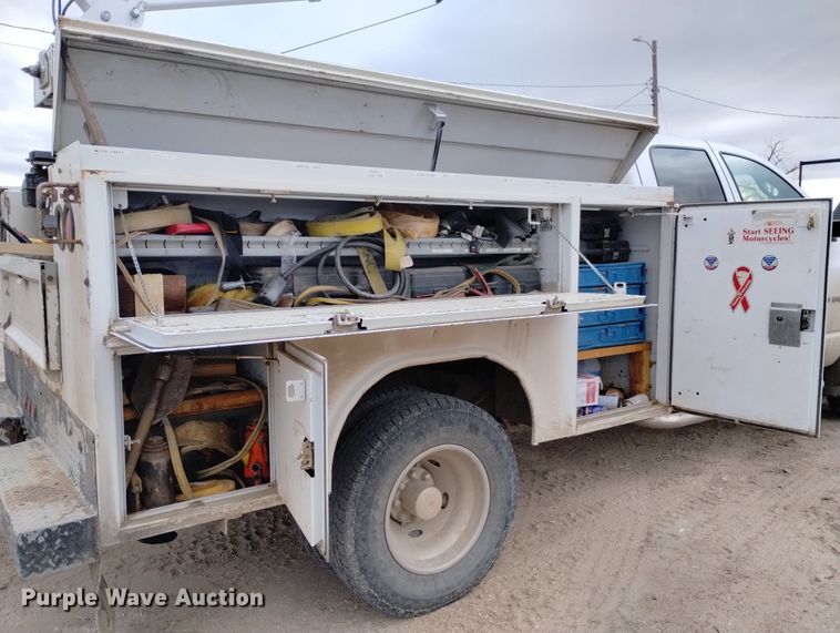 image for item DN6357 2003 Dodge Ram 3500  Quad Cab utility bed pickup truck