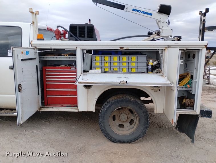 image for item DN6357 2003 Dodge Ram 3500  Quad Cab utility bed pickup truck