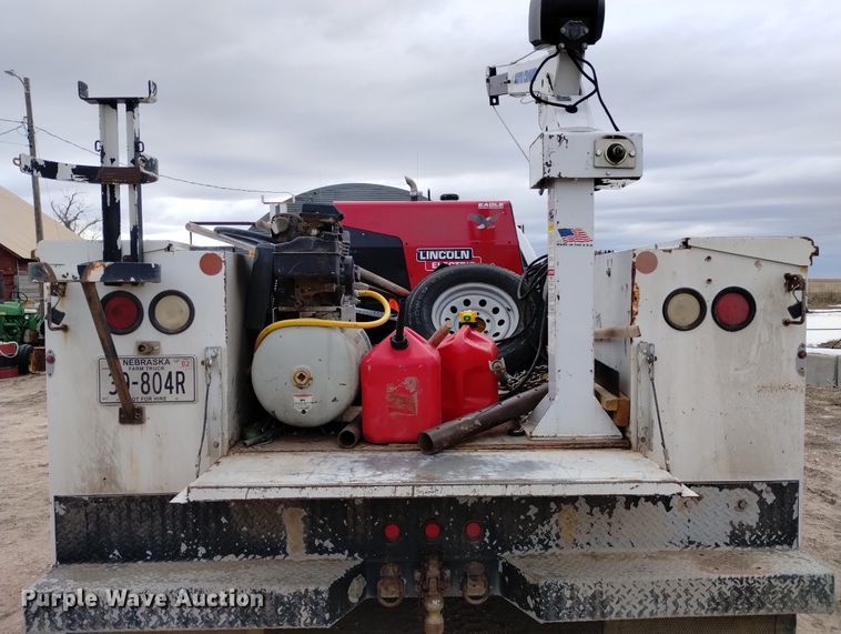 image for item DN6357 2003 Dodge Ram 3500  Quad Cab utility bed pickup truck