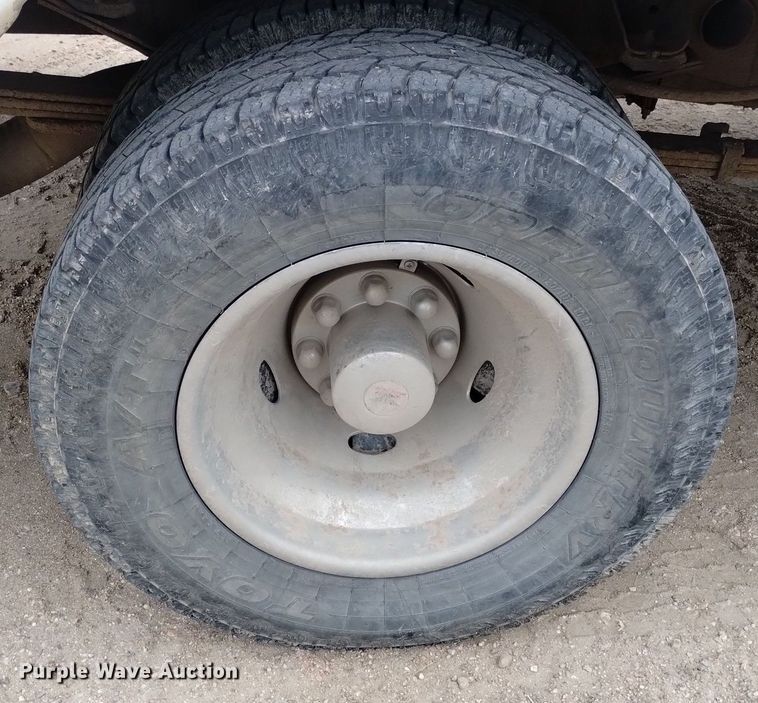 image for item DN6357 2003 Dodge Ram 3500  Quad Cab utility bed pickup truck