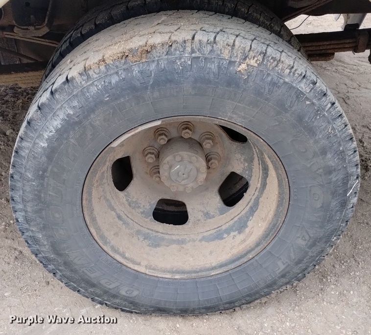 image for item DN6357 2003 Dodge Ram 3500  Quad Cab utility bed pickup truck