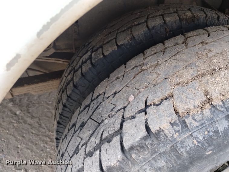 image for item DN6357 2003 Dodge Ram 3500  Quad Cab utility bed pickup truck