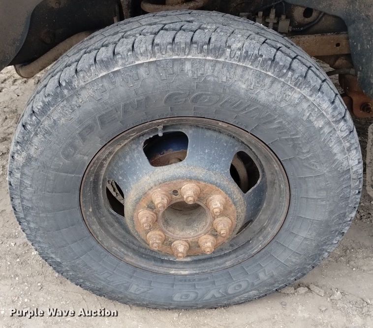 image for item DN6357 2003 Dodge Ram 3500  Quad Cab utility bed pickup truck