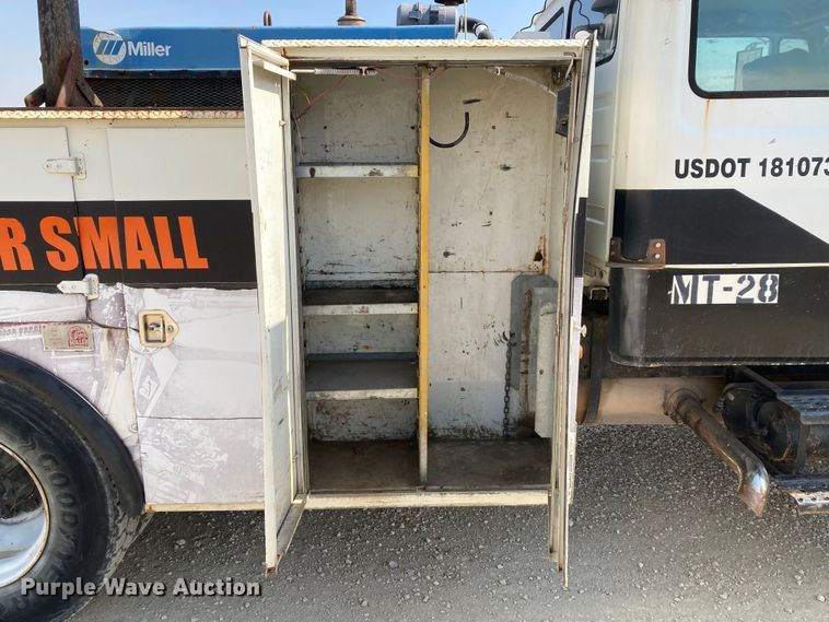 image for item HN9825 2000 Freightliner FL70  utility / service truck