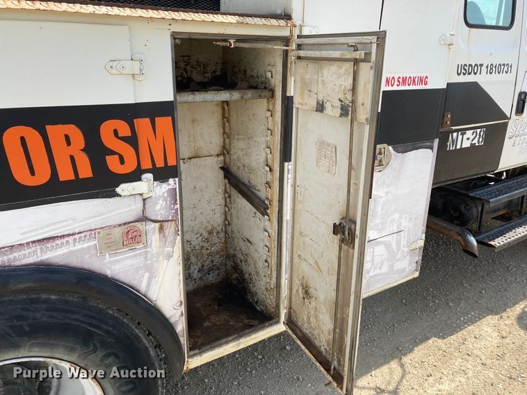 image for item HN9825 2000 Freightliner FL70  utility / service truck