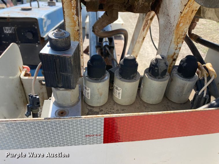 image for item HN9825 2000 Freightliner FL70  utility / service truck