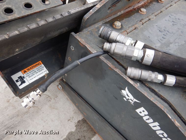 image for item IO9498 2017 Bobcat 24PLA  skid steer cold planer