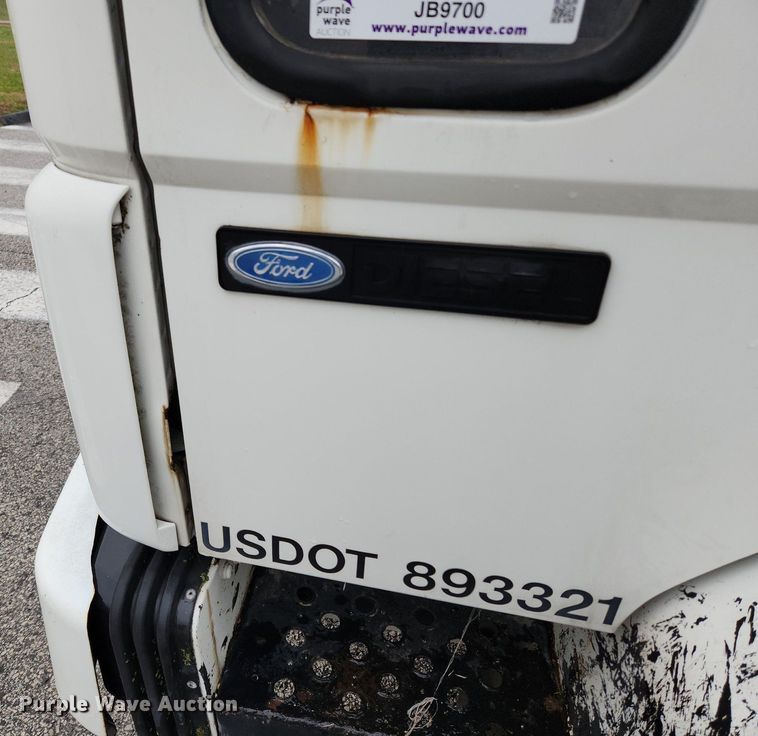 image for item JB9700 1987 Ford CF7000  seal coat truck