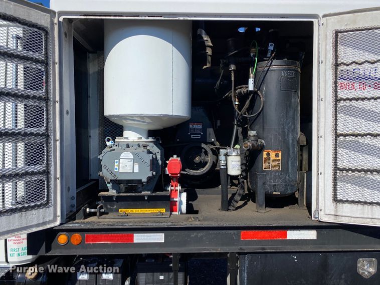 image for item JW9175 2003 Freightliner FL70  vacuum truck