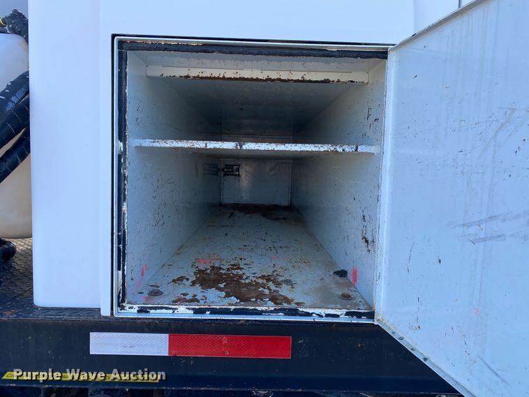 image for item JW9175 2003 Freightliner FL70  vacuum truck