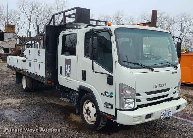 image for item LH9958 2018 Isuzu NPR  flatbed truck