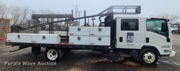 image for item LH9958 2018 Isuzu NPR  flatbed truck