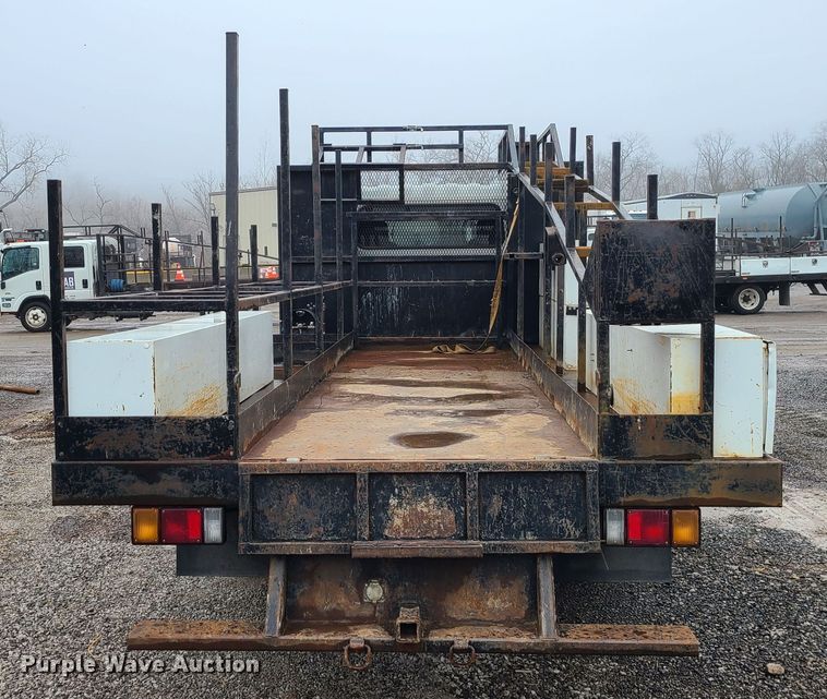 image for item LH9958 2018 Isuzu NPR  flatbed truck