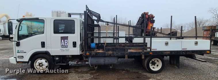 image for item LH9958 2018 Isuzu NPR  flatbed truck