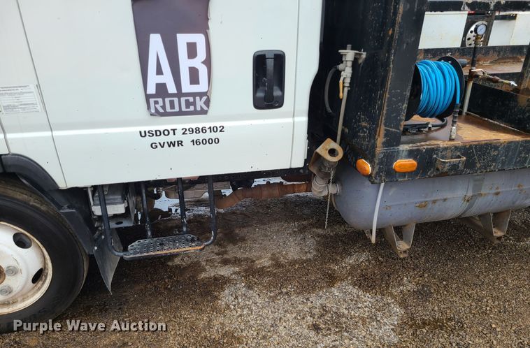 image for item LH9958 2018 Isuzu NPR  flatbed truck