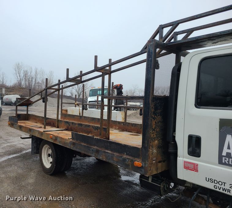 image for item LH9961 2016 Isuzu NPR  flatbed truck
