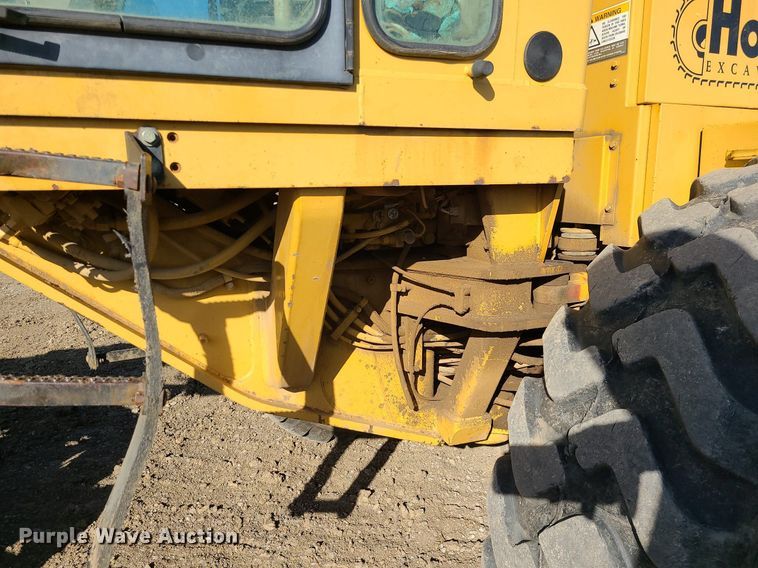 image for item MX9601 1999 Caterpillar 140H  motor grader